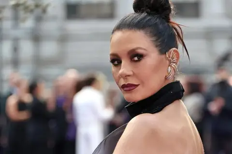 Catherine Zeta-Jones and Joanna Lumley Ace Gothic Glam at “Wednesday” Premiere